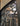 arched iron and glass door with intricate design