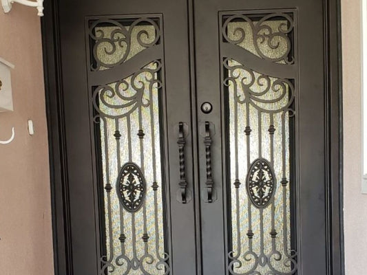 A Guide to Pairing Wrought Iron Doors With Renovated Home Exteriors