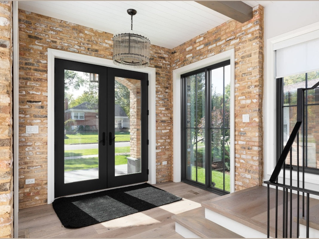 French iron door vs traditional entry doors