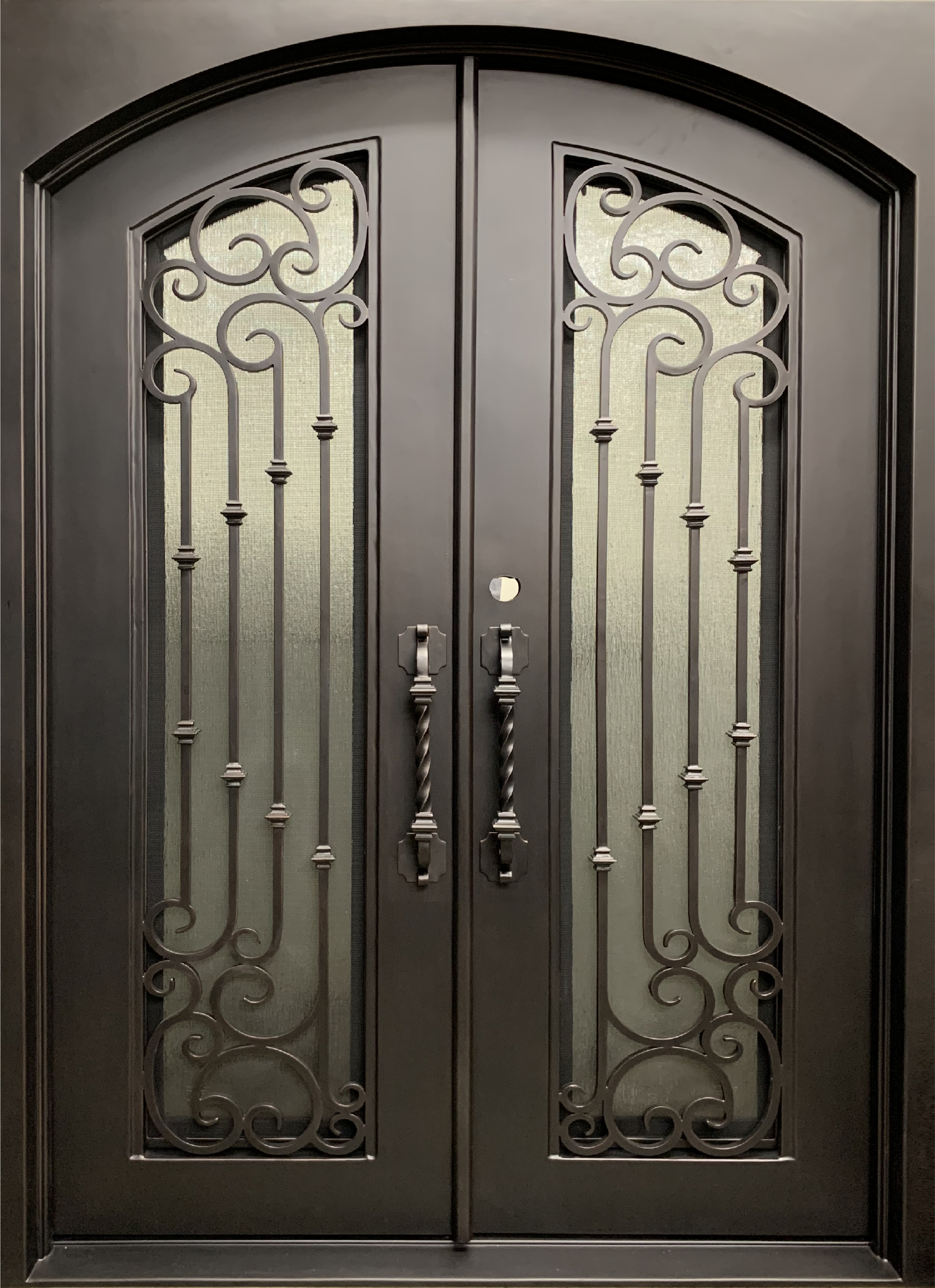 arched iron doors with glass panels